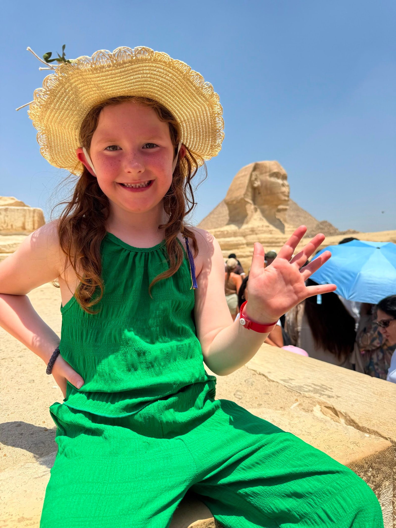 Young traveler enjoying a family visit to the Great Sphinx in Giza